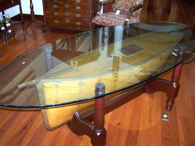 A large19th century English Plank-on-frame Pond Boat set into a custom made mahogany cradle base